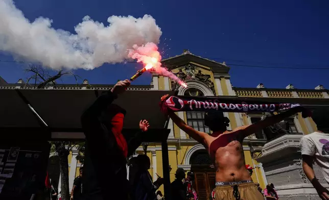 Pro-Palestinian supporters protest in Santiago, Chile, Saturday, Oct. 5, 2024. (AP Photo/Esteban Felix)