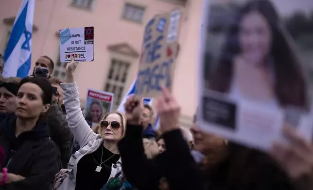 People attend a demonstration in support of Israel to mark the first anniversary of the Hamas attack on Israel, in Berlin, Germany, Sunday, Oct. 6, 2024. (AP Photo/Markus Schreiber)