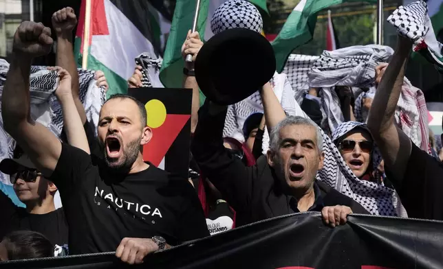 Pro-Palestinian supporters rally in Sydney, Sunday, Oct. 6, 2024. (AP Photo/Rick Rycroft)