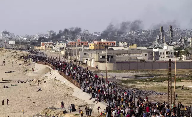 FILE - Palestinians are waiting for aid trucks to cross in central Gaza Strip on May 19, 2024. (AP Photo/Abdel Kareem Hana, File)