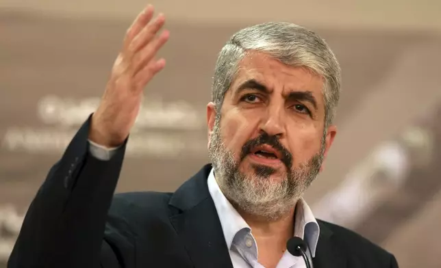 FILE - Khaled Mashaal, at the time, leader of the militant group Hamas that has governed Gaza since a 2007 takeover, speaks during a speech held in Doha, Qatar, on Aug. 28, 2014. (AP Photo/Osama Faisal, File)