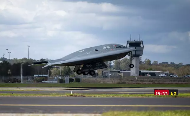 In this photo released by U.S. Air National Guard, a U.S. Air Force B-2 Spirit stealth bomber takes off from a Royal Australian Air Force base in Amberley, Australia, Sept. 11, 2024. U.S. long-range B-2 stealth bombers launched airstrikes early Thursday, Oct. 17, 2024, targeting underground bunkers used by Yemen's Houthi rebels, officials said. (Staff Sgt. Whitney Erhart/U.S. Air National Guard via AP)