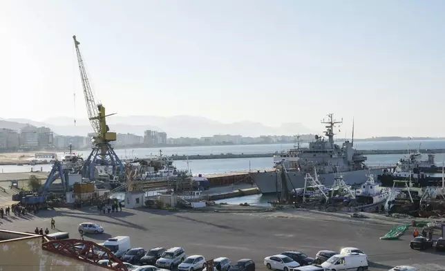 The Italian navy ship Libra is docked at Shengjin port northwestern Albania Wednesday, Oct. 16, 2024, carrying the first group of migrants who were intercepted in international waters and redirected to Albania in force of an agreement between the two counties.. (AP Photo/Vlasov Sulaj)