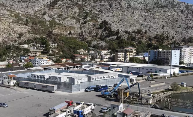 A general view of a migrant processing center at the port of Shengjin, northwestern Albania Wednesday, Oct. 16, 2024, as the first group of migrants who were intercepted in international waters arrived Wednesday. (AP Photo/Vlasov Sulaj)