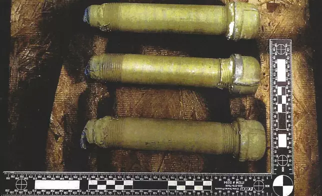 This image used as evidence by federal prosecutors shows pipe bombs confiscated from the home of Chris Arthur in Mount Olive, N.C. (U.S. District Court for the Eastern District of North Carolina via AP)