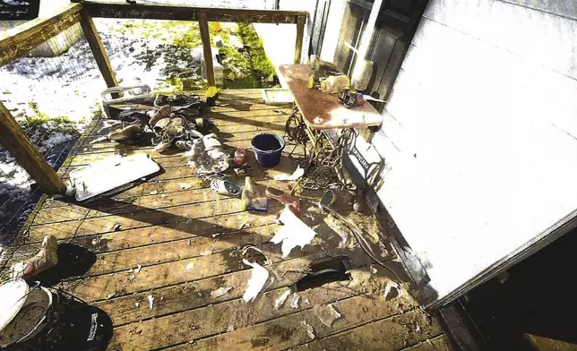 This image used as evidence shows the front porch where federal prosecutors say Chris Arthur hid a bomb at his home in Mount Olive, N.C. (U.S. District Court for the Eastern District of North Carolina via AP)