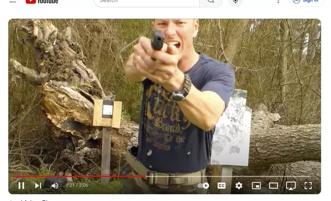 This image from a YouTube video posted by Chris Arthur on March 20, 2018, shows him with a handgun during a training video. Arthur was a member of the North Carolina National Guard at the time he posted the video. (AP Photo)