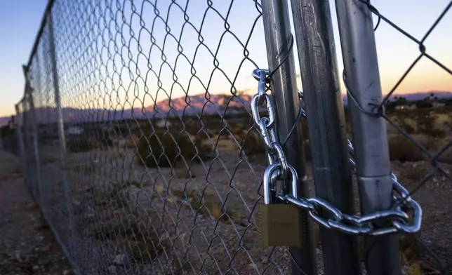 A construction fence secures the site where The Church of Jesus Christ of Latter-day Saints plans to build a new temple near Las Vegas, Sept. 27, 2024. (AP Photo/Ty ONeil)