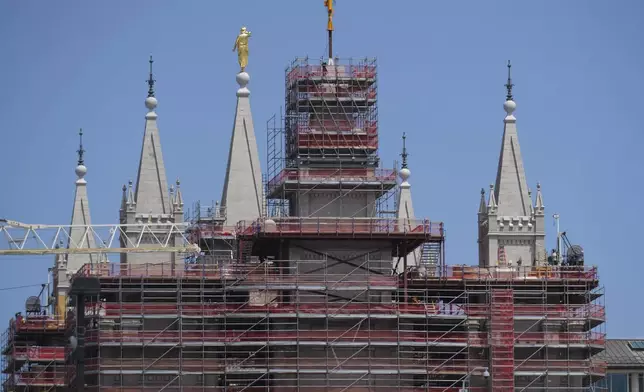 A view of the ongoing Temple Square renovation project, showing the Salt Lake Temple enveloped in scaffolding, is seen on June 17, 2024, in Salt Lake City. (AP Photo/Rick Bowmer)