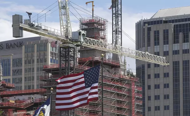 A view of the ongoing Temple Square renovation project, showing the Salt Lake Temple enveloped in scaffolding, is seen on June 17, 2024, in Salt Lake City. (AP Photo/Rick Bowmer)