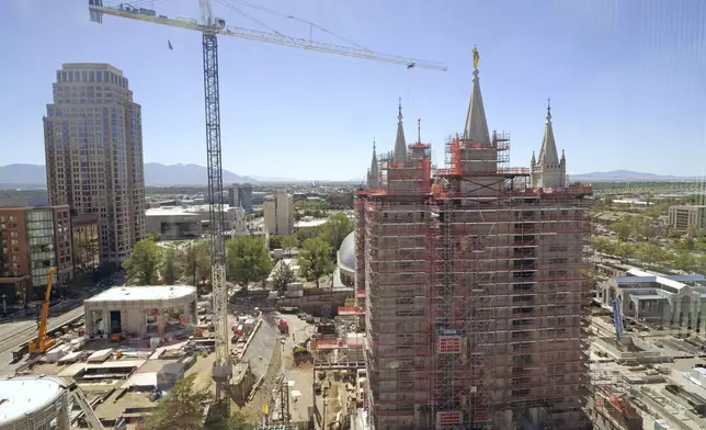 A view of the ongoing Temple Square renovation project, showing the Salt Lake Temple enveloped in scaffolding, is seen on June 4, 2024, in Salt Lake City. (AP Photo/Rick Bowmer)