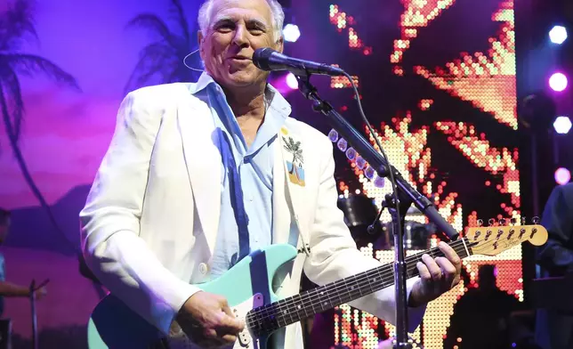 FILE - Jimmy Buffett performs at the after party for the premiere of "Jurassic World" in Los Angeles, on June 9, 2015. (Photo by Matt Sayles/Invision/AP, File)