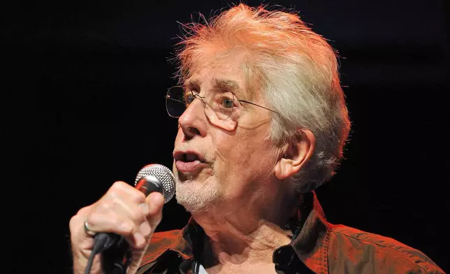 FILE - English blues singer John Mayall performs with his band The Bluesbreakers, on the stage of the Miles Davis hall during the 42nd Montreux Jazz Festival in Montreux, Switzerland, late Monday, July 7, 2008. (Sandro Campardo/Keystone via AP, File)