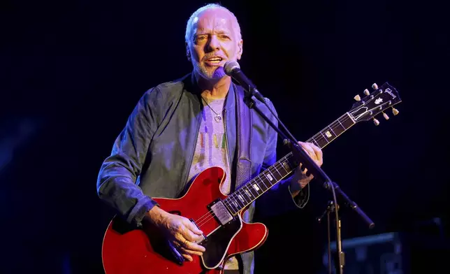 FILE - Peter Frampton performs during "Finale - The Farewell Tour" at Huntington Bank Pavilion on Sunday, July 28, 2019, in Chicago. (Photo by Rob Grabowski/Invision/AP, File)