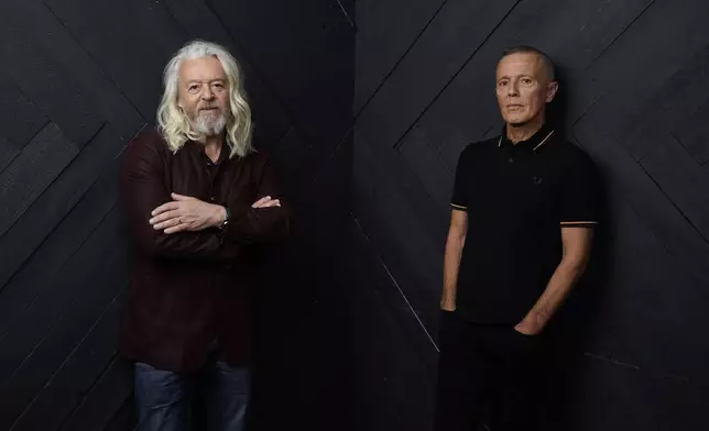 FILE - Roland Orzabal, left, and Curt Smith, of the band Tears For Fears, pose for a portrait in Los Angeles on Jan. 19, 2022. (AP Photo/Chris Pizzello, File)