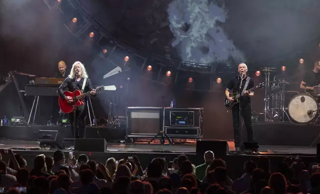 FILE - Roland Orzabal, left, and Curt Smith, right, of Tears for Fears, perform at Ameris Bank Amphitheatre on Sunday, June 12 2022, in Alpharetta, Ga. (Photo by Paul R. Giunta/Invision/AP, File)