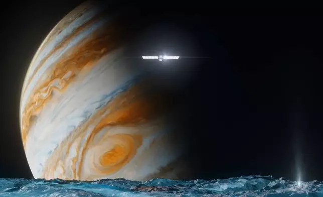 This illustration provided by NASA depicts the Europa Clipper spacecraft above the surface of the moon Europa, foreground, and Jupiter behind. (NASA/JPL-Caltech via AP)