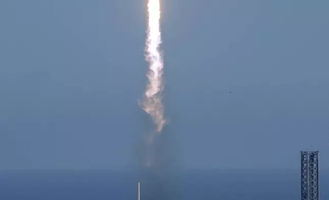 A SpaceX Falcon Heavy rocket with a NASA spacecraft bound for Jupiter lifts off from pad 39A at the Kennedy Space Center Monday, Oct. 14, 2024 in Cape Canaveral, Fla. (AP Photo/John Raoux)