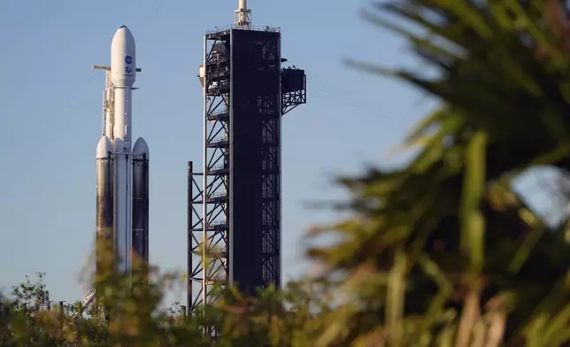 A SpaceX Falcon Heavy rocket with a NASA spacecraft bound for Jupiter stands ready for launch on pad 39A at the Kennedy Space Center Monday, Oct. 14, 2024 in Cape Canaveral, Fla. (AP Photo/John Raoux)