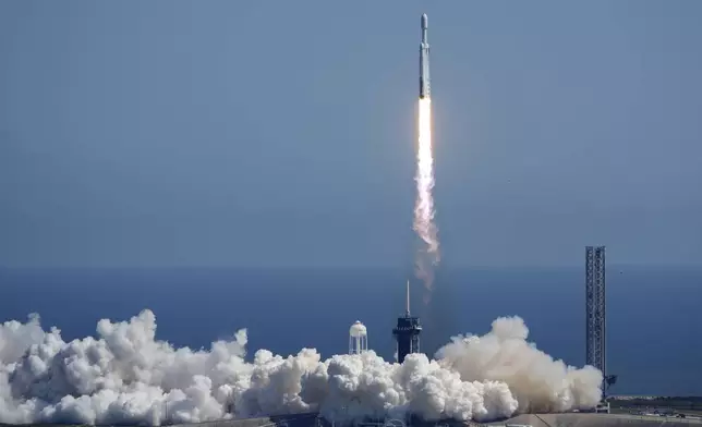 A SpaceX Falcon Heavy rocket with a NASA spacecraft bound for Jupiter lifts off from pad 39A at the Kennedy Space Center Monday, Oct. 14, 2024 in Cape Canaveral, Fla. (AP Photo/John Raoux)