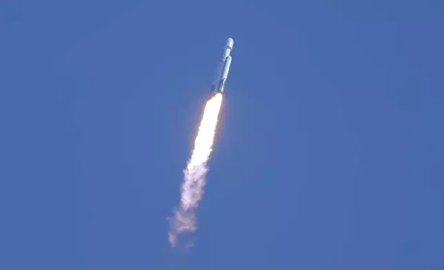 A SpaceX Falcon Heavy rocket with a NASA spacecraft bound for Jupiter lifts off from pad 39A at the Kennedy Space Center Monday, Oct. 14, 2024 in Cape Canaveral, Fla. (AP Photo/John Raoux)