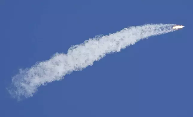 A SpaceX Falcon Heavy rocket with a NASA spacecraft bound for Jupiter lifts off from pad 39A at the Kennedy Space Center Monday, Oct. 14, 2024 in Cape Canaveral, Fla. (AP Photo/John Raoux)