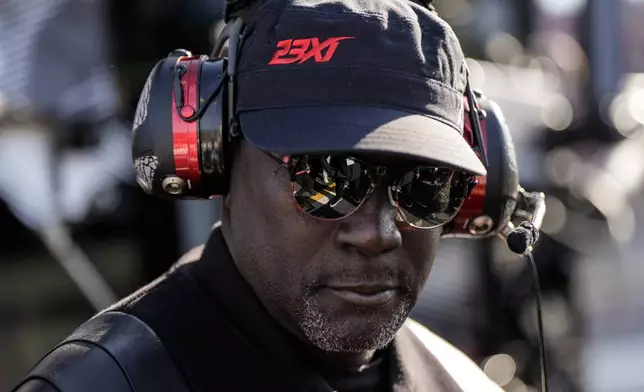 FILE - 23XI Racing co-owner Michael Jordan stands in the pit area during a NASCAR Cup Series auto race at Talladega Superspeedway, Sunday, April 21, 2024, in Talladega. Ala. (AP Photo/Mike Stewart, File)