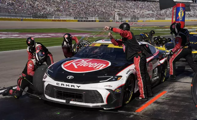 NASCAR Cup Series driver Joey Logano (22) makes a pit stop during a NASCAR Cup Series auto race Sunday, Oct. 20, 2024, in Las Vegas. (AP Photo/John Locher)