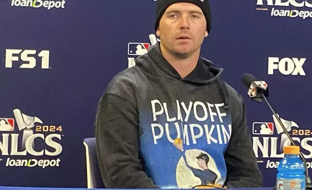 New York Mets first baseman Pete Alonso speaks before Game 3 of a baseball NL Championship Series against the Los Angeles Dodgers, Wednesday, Oct. 16, 2024, in New York. (AP Photo/Ron Blum)