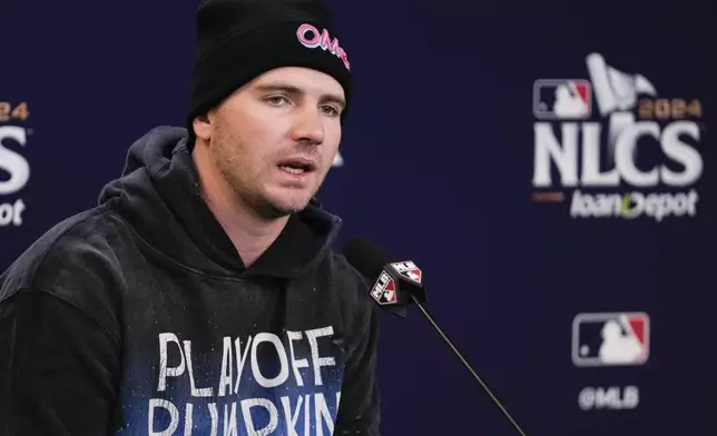 New York Mets' Pete Alonso speaks during a news conference before Game 3 of a baseball NL Championship Series against the Los Angeles Dodgers, Wednesday, Oct. 16, 2024, in New York. (AP Photo/Frank Franklin II)