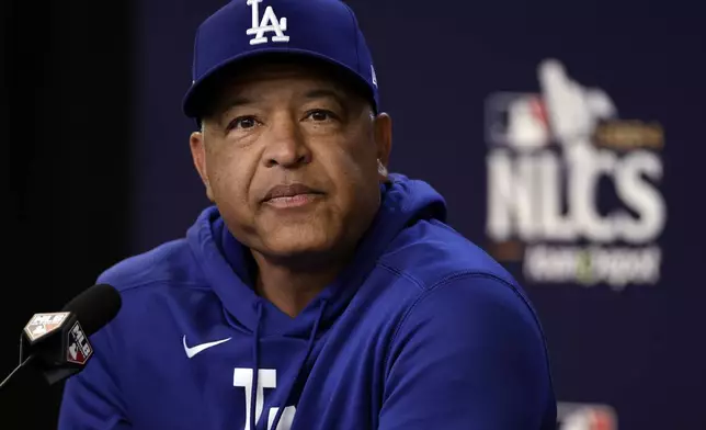 Los Angeles Dodgers manager Dave Roberts talks to the media Tuesday, Oct. 15, 2024, in New York ahead of Game 3 of the baseball NL Championship Series against the New York Mets. (AP Photo/Adam Hunger)