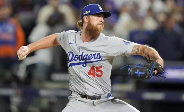 Los Angeles Dodgers pitcher Michael Kopech throws against the New York Mets during the fifth inning in Game 3 of a baseball NL Championship Series, Wednesday, Oct. 16, 2024, in New York. (AP Photo/Frank Franklin II)