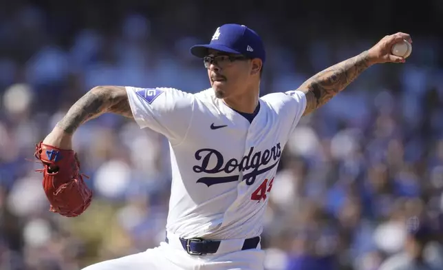 Los Angeles Dodgers relief pitcher Anthony Banda throws against the New York Mets during the fourth inning in Game 2 of a baseball NL Championship Series, Monday, Oct. 14, 2024, in Los Angeles. (AP Photo/Ashley Landis)