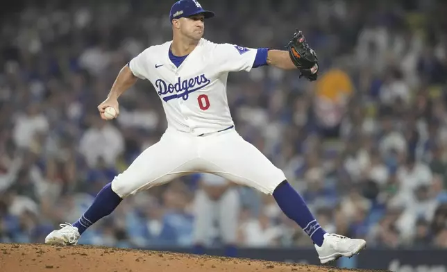 Los Angeles Dodgers pitcher Jack Flaherty throws during the seventh inning in Game 1 of a baseball NL Championship Series against the New York Mets, Sunday, Oct. 13, 2024, in Los Angeles. (AP Photo/Ashley Landis)