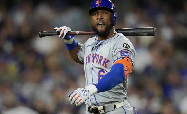 New York Mets' Starling Marte reacts after striking out against the Los Angeles Dodgers during the fifth inning in Game 6 of a baseball NL Championship Series, Sunday, Oct. 20, 2024, in Los Angeles. (AP Photo/Julio Cortez)