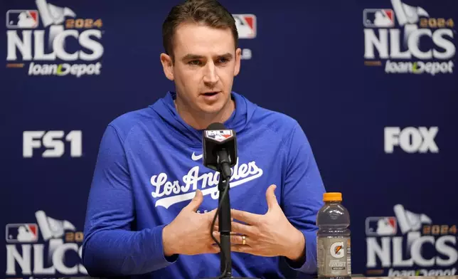 Los Angeles Dodgers pitcher Evan Phillips speaks during a news conference ahead of Game 6 in a baseball NL Championship Series against the New York Mets, Saturday, Oct. 19, 2024, in Los Angeles. (AP Photo/Mark J. Terrill)