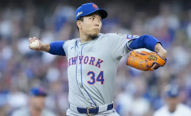 New York Mets pitcher Kodai Senga throws against the Los Angeles Dodgers during the first inning in Game 1 of a baseball NL Championship Series, Sunday, Oct. 13, 2024, in Los Angeles. (AP Photo/Ashley Landis)