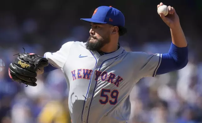 New York Mets starting pitcher Sean Manaea throws against the Los Angeles Dodgers during the second inning in Game 2 of a baseball NL Championship Series, Monday, Oct. 14, 2024, in Los Angeles. (AP Photo/Ashley Landis)