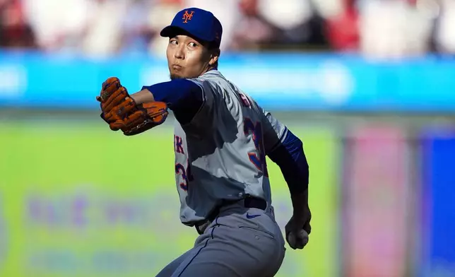 New York Mets' Kodai Senga pitches during the first inning of Game 1 of a baseball NL Division Series against the Philadelphia Phillies, Saturday, Oct. 5, 2024, in Philadelphia. (AP Photo/Chris Szagola)