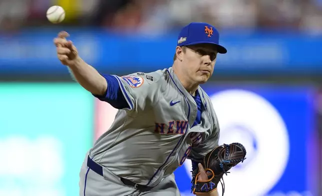 New York Mets' Phil Maton pitches during the eighth inning of Game 1 of a baseball NL Division Series against the Philadelphia Phillies, Saturday, Oct. 5, 2024, in Philadelphia. (AP Photo/Chris Szagola)