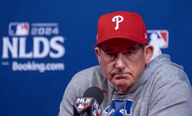 Philadelphia Phillies manager Rob Thomson speaks during a baseball news conference in Philadelphia, Friday, Oct. 4, 2024, ahead of the National League Division Series. (AP Photo/Chris Szagola)