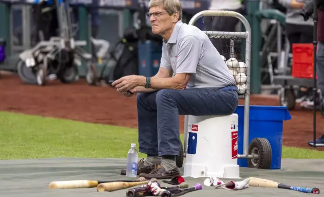 Philadelphia Phillies owner John Middleton watches practice during a baseball workout in Philadelphia, Friday, Oct. 4, 2024, ahead of the National League Division Series against the New York Mets. (AP Photo/Chris Szagola)