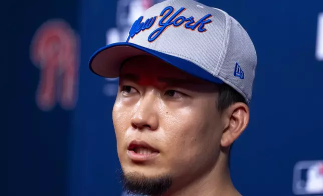 New York Mets' Kodai Senga speaks during a baseball news conference, Friday, Oct. 4, 2024, in Philadelphia, ahead of the National League Division Series against the Philadelphia Phillies. (AP Photo/Chris Szagola)