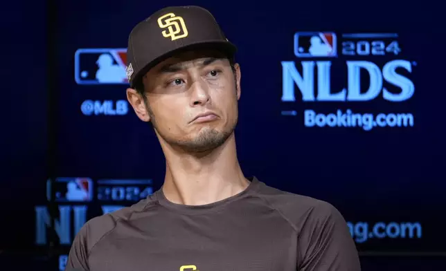 San Diego Padres pitcher Yu Darvish fields questions ahead of Game 5 of a baseball NL Division Series against the Los Angeles Dodgers, Thursday, Oct. 10, 2024, in Los Angeles. (AP Photo/Ashley Landis)