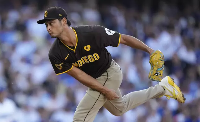 San Diego Padres pitcher Yu Darvish throws to a Los Angeles Dodgers batter during the first inning in Game 2 of a baseball NL Division Series Sunday, Oct. 6, 2024, in Los Angeles. (AP Photo/Mark J. Terrill)