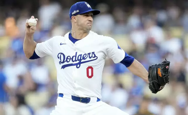 Los Angeles Dodgers pitcher Jack Flaherty throws to a San Diego Padres batter during the first inning in Game 2 of a baseball NL Division Series Sunday, Oct. 6, 2024, in Los Angeles. (AP Photo/Ashley Landis)