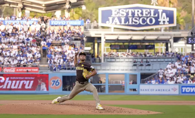 San Diego Padres pitcher Yu Darvish throws to a Los Angeles Dodgers batter during the second inning in Game 5 of a baseball NL Division Series Friday, Oct. 11, 2024, in Los Angeles. (AP Photo/Mark J. Terrill)