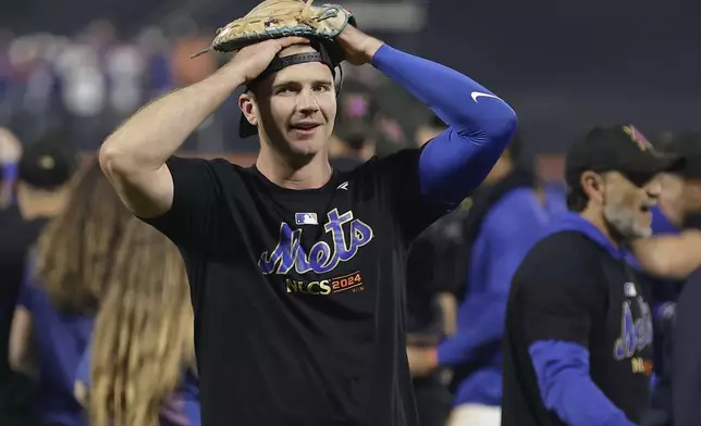 New York Mets first baseman Pete Alonso celebrates after the Mets defeated the Philadelphia Phillies in Game 4 of the National League baseball playoff series, Wednesday, Oct. 9, 2024, in New York. (AP Photo/Adam Hunger)