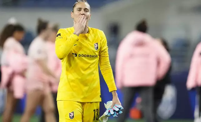 Angel City FC goalkeeper DiDi Haracic blows a kiss to supporters after beating the Seattle Reign 1-0 in an NWSL soccer match Friday, Oct. 4, 2024, in Seattle. (AP Photo/Lindsey Wasson)