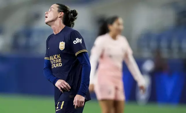 Seattle Reign defender Phoebe McClernon reacts as time expires and Angel City FC wins 1-0 during the second half of an NWSL soccer match Friday, Oct. 4, 2024, in Seattle. (AP Photo/Lindsey Wasson)